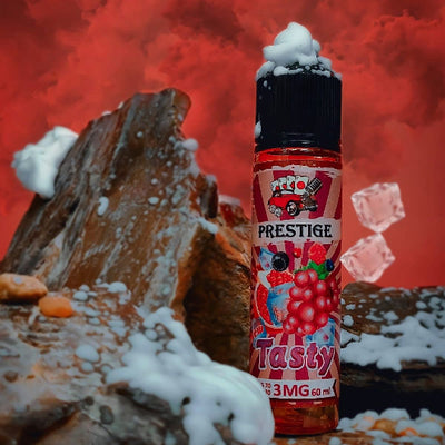 Vape juice bottle labeled 'PRESTIGE Tasty' on a snowy background