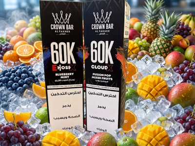 Al Fakher Crown Bar 60K Puffs Disposable Vape setup sitting next to its factory box container.