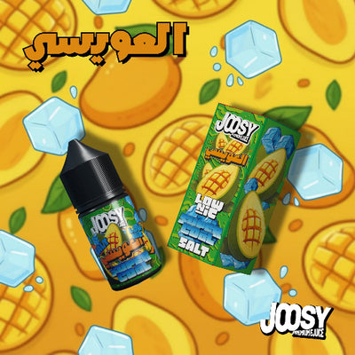 JOOSY vape juice bottle and packaging on a pineapple-themed background