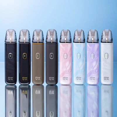 Row of electronic devices in various colors on a reflective surface with a light blue gradient background.