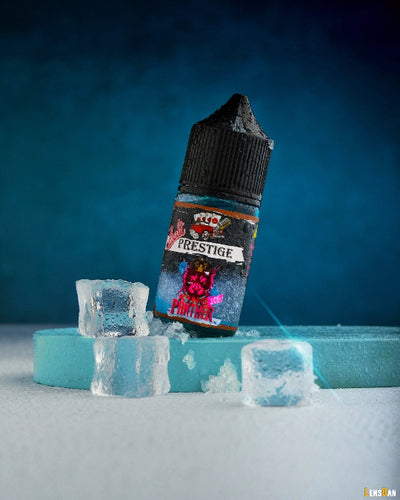 Prestige E-Liquid bottle with ice cubes on a blue background