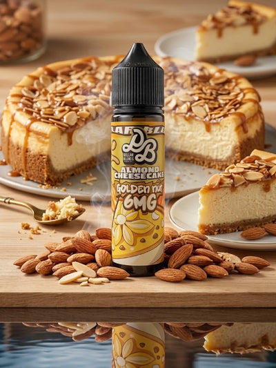 A bottle of 6MG e-liquid flavoring labeled 'Almond Cheesecake Golden Rat' stands on a wooden surface surrounded by almonds, with cheesecakes and slices in the background.