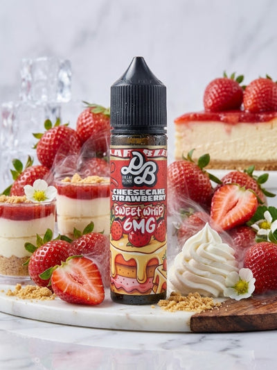 A bottle of LB Vape Strawberry Sweet Whip 6MG e-liquid stands on a marble board surrounded by fresh strawberries, cheesecake cups, a slice of cheesecake, whipped cream, and cookie crumbs. The bottle label reads 'LB Vape' and 'Cheesecake Strawberry Sweet Whip 6MG'.