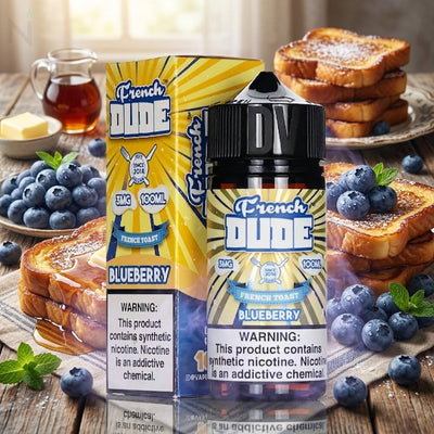 French Dude Blueberry e-liquid bottle and packaging box displayed on a rustic wooden table surrounded by blueberries, toast, and butter. The bottle and box feature a yellow sunburst design with blue and white text.