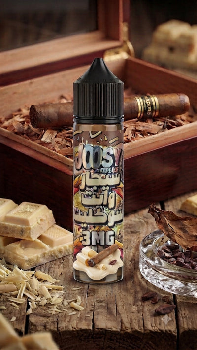 A bottle of 303.1 e-liquid with a black cap and a detailed flavor label, set on a rustic wooden table surrounded by cigars, tobacco leaves, and chocolate pieces.